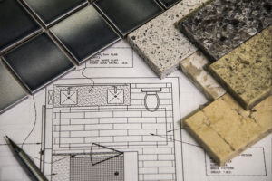 Remodeling plans with tile samples for a bathroom remodel done by a small home improvement company in Springfield, Illinois