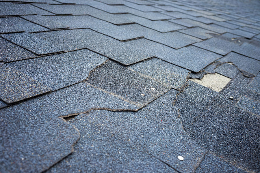 Roof damage in need of roof repair from home improvement company in Springfield, IL.