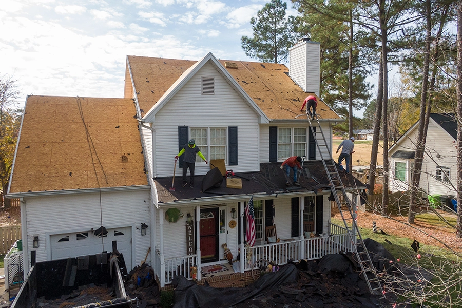 A residential roof replacement being carried out by professional roofers in Springfield, IL.