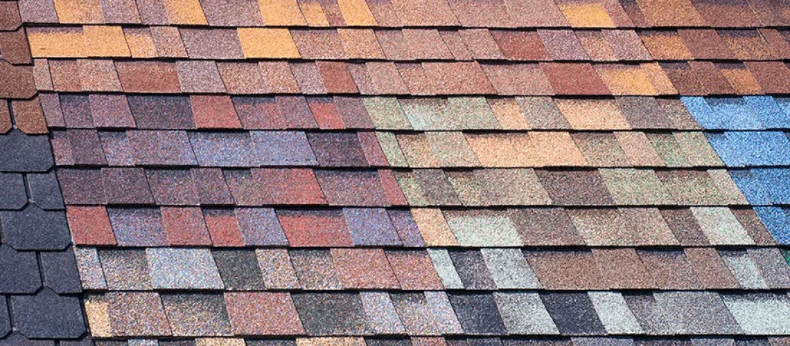 Multi-colored shingles as a sample of product advertising for new roof colors in Springfield, IL
